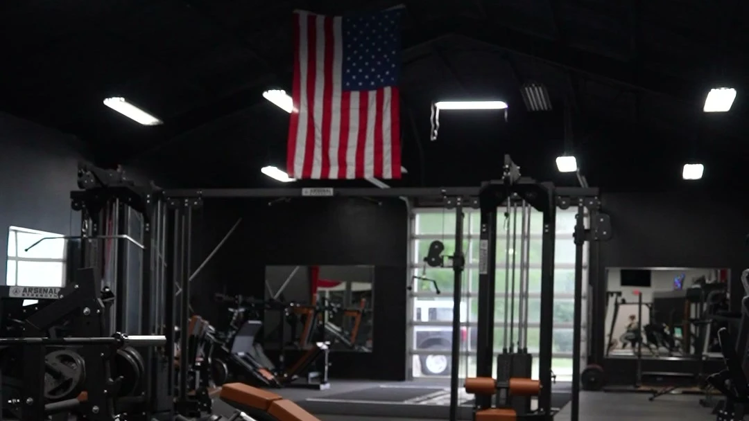 Strikeline strength floor with Arsenal equipment and the American flag